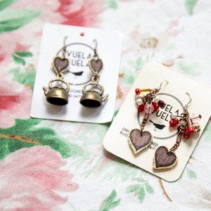 Two pairs of dangle earrings